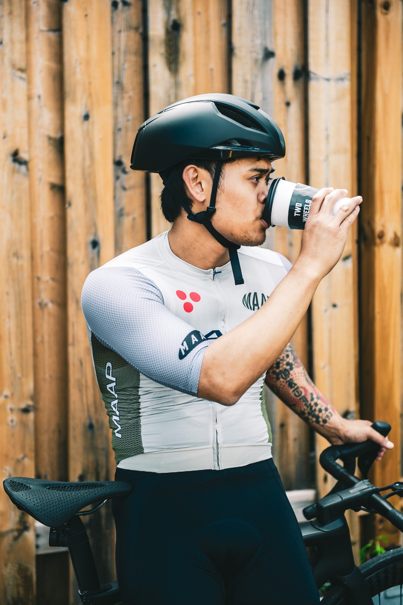 Coffee balanced on a bike top tube